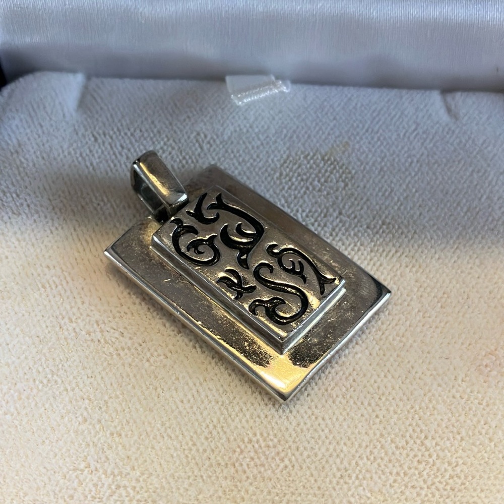 Sterling silver pendant 
1  1/2 inches length 
Just needs chain to wear